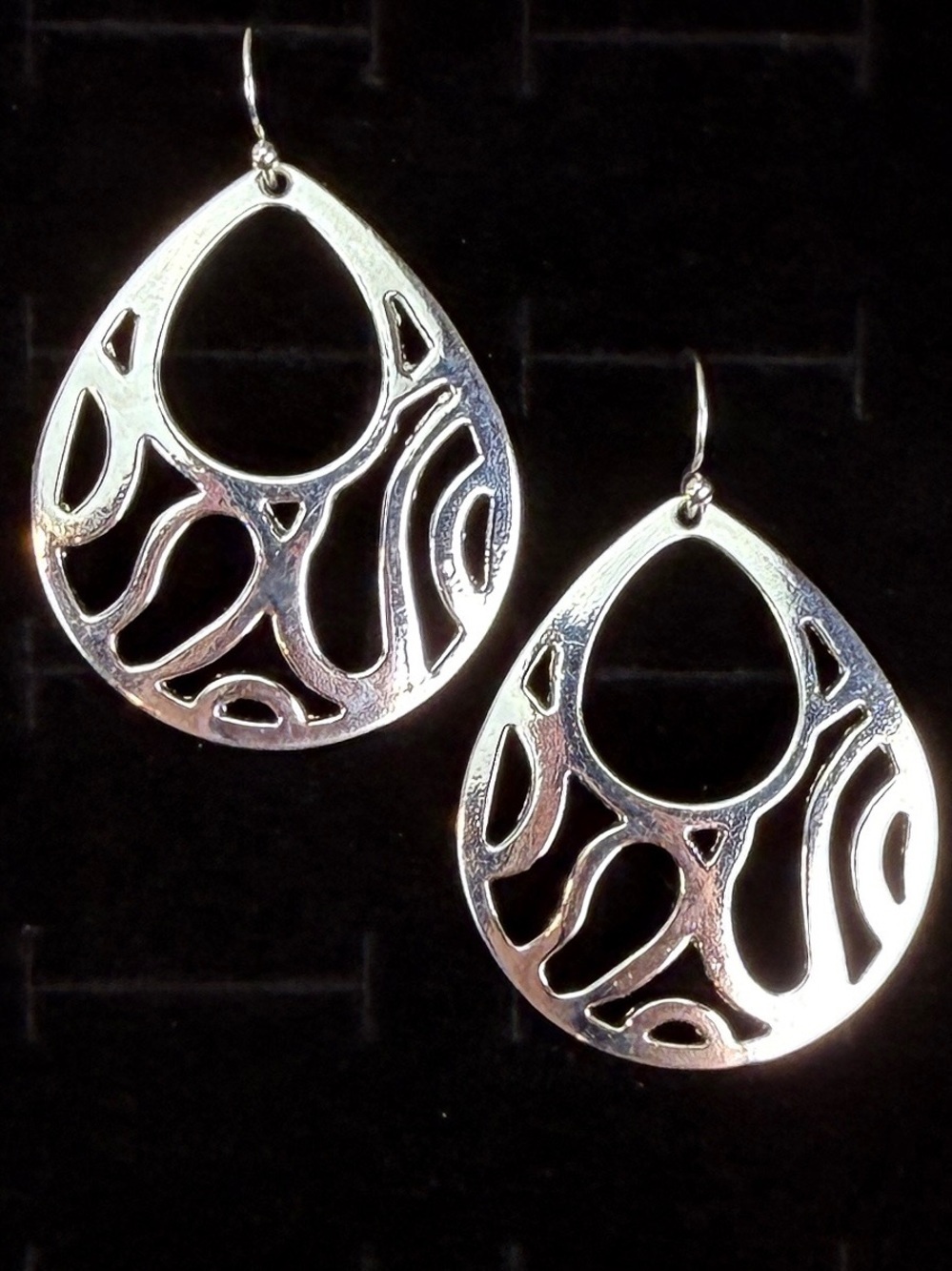 Vintage aged, Silvertone weighted teardrop cut out pierced earrings